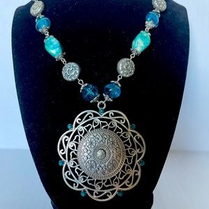 Teal color beads with large metal flower pendant statement necklace